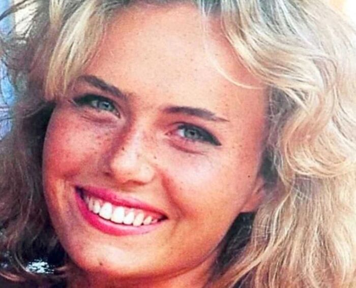 Close-up of a smiling young woman with blonde hair, representing chilling disappearances from the 90s that remain baffling.