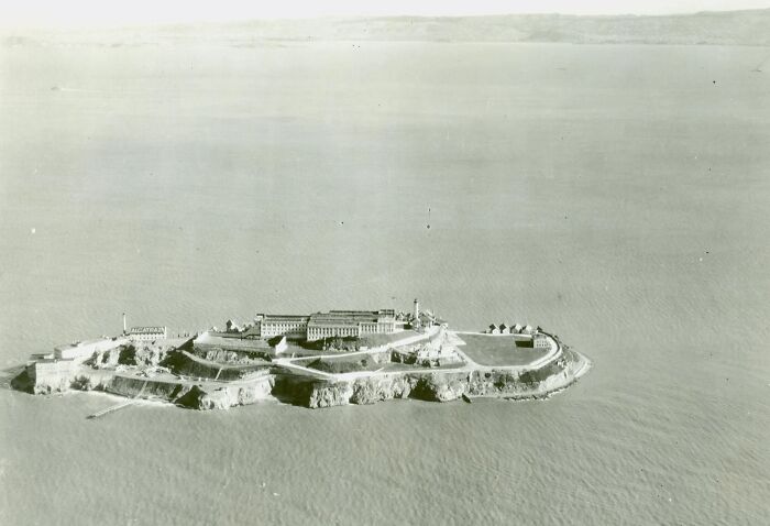 Aerial view of Alcatraz Island showing prison buildings and rocky shoreline highlighting life on Alcatraz.