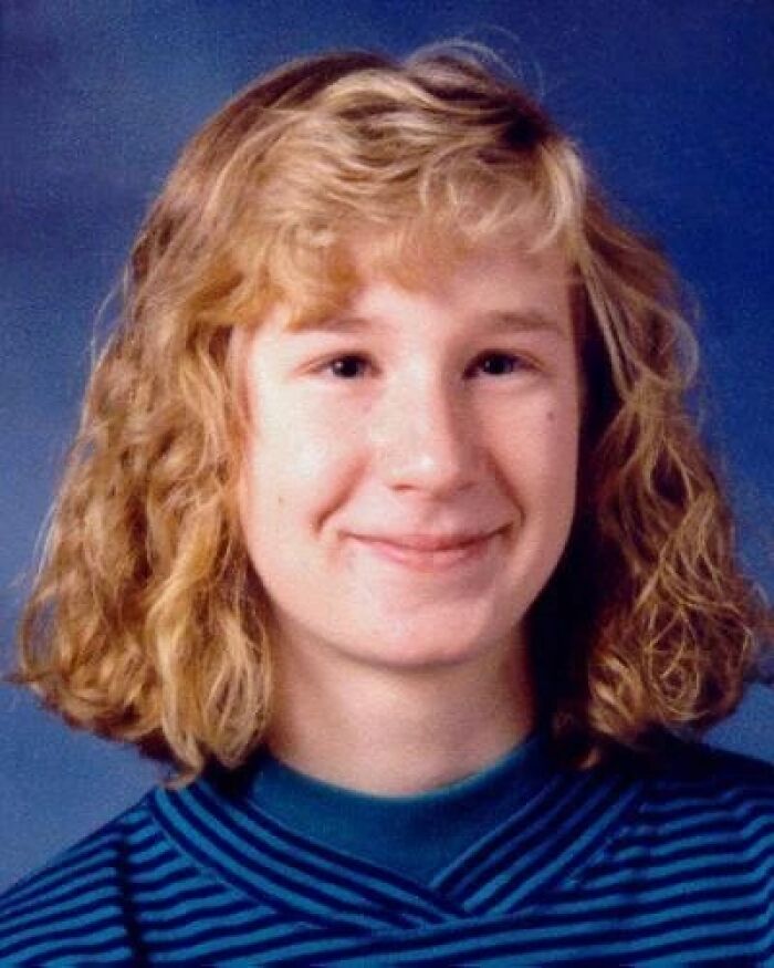 Portrait of a young girl with curly blonde hair against a blue background related to 90s chilling disappearances.