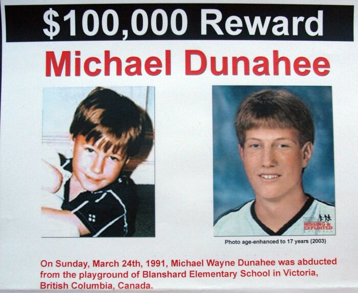 Reward poster showing photos of Michael Dunahee, a chilling disappearance from the ’90s that remains unsolved and baffling.