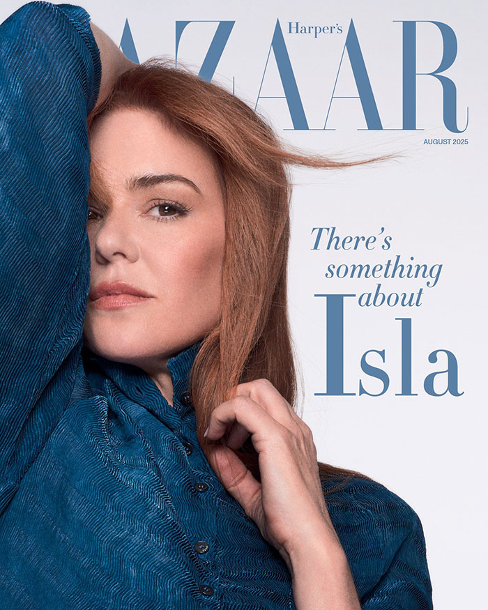Isla Fisher posing in a blue outfit for Harper's Bazaar cover, addressing tough couple of years amid split with Sasha Baron Cohen. Isla Fisher posing in a blue outfit for Harper's Bazaar cover, addressing tough couple of years amid split with Sasha Baron Cohen.
