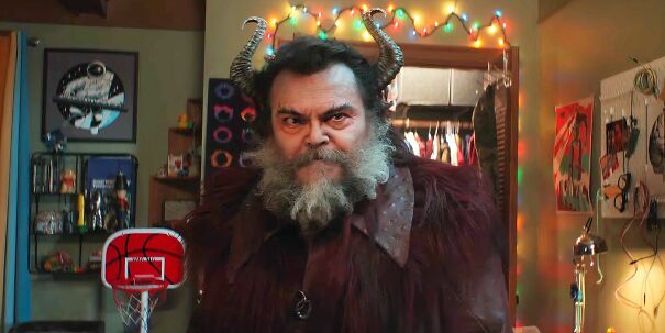 jack-black-as-satan-standing-in-a-kid-s-bedroom-in-dear-santa-2024.jpg