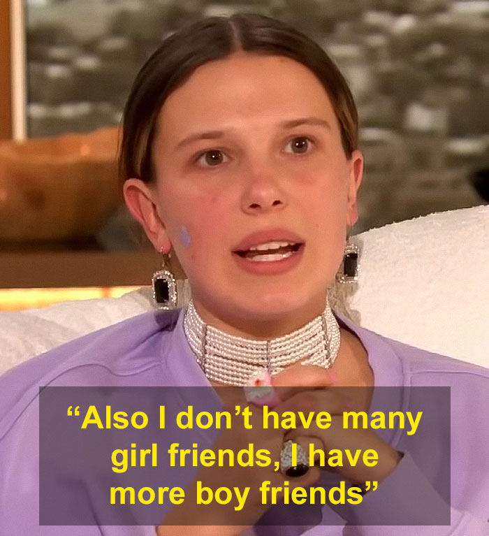Millie Bobby Brown wearing earrings and choker, discussing friendships in a resurfaced interview after adopting a baby at 21. Millie Bobby Brown wearing earrings and choker, discussing friendships in a resurfaced interview after adopting a baby at 21.