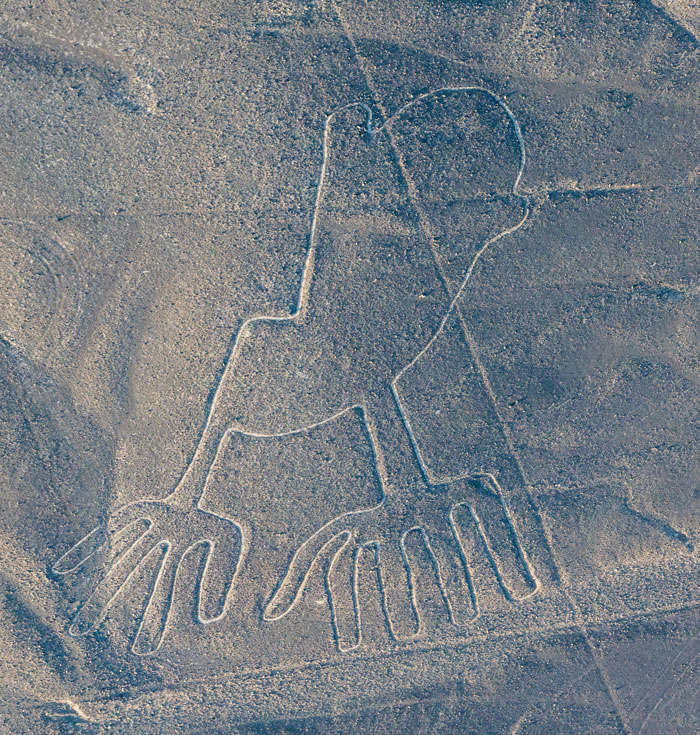 Aerial view of ancient geoglyph carved into the desert ground, discovered with help of AI technology. Aerial view of ancient geoglyph carved into the desert ground, discovered with help of AI technology.