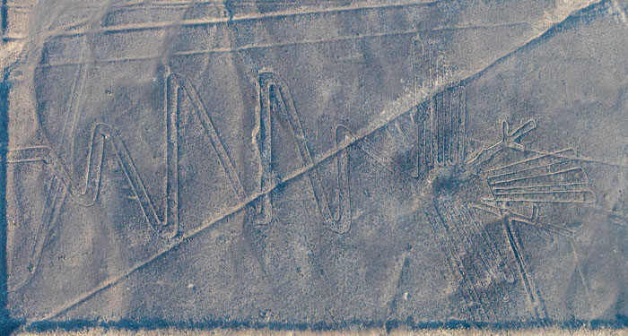 Aerial view of ancient geoglyphs in desert terrain, showcasing AI-assisted discovery of 303 geoglyphs puzzle. Aerial view of ancient geoglyphs in desert terrain, showcasing AI-assisted discovery of 303 geoglyphs puzzle.