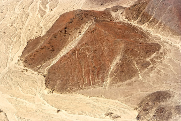 Aerial view of a geoglyph discovered using AI technology, showcasing one of the biggest historical puzzles in the desert. Aerial view of a geoglyph discovered using AI technology, showcasing one of the biggest historical puzzles in the desert.