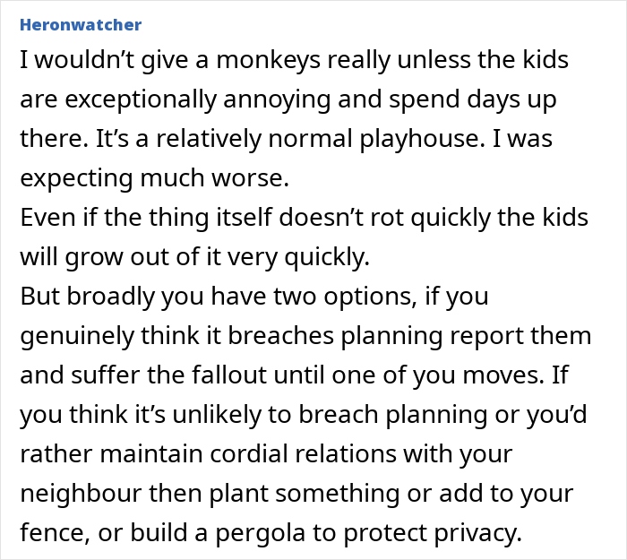 Woman frustrated as neighbor’s kids’ playhouse is bigger and blocks privacy in residential area. Woman frustrated as neighbor’s kids’ playhouse is bigger and blocks privacy in residential area.
