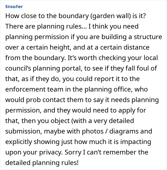 Woman frustrated that neighbor's kids' playhouse is bigger than her house, blocking privacy and causing upset. Woman frustrated that neighbor's kids' playhouse is bigger than her house, blocking privacy and causing upset.