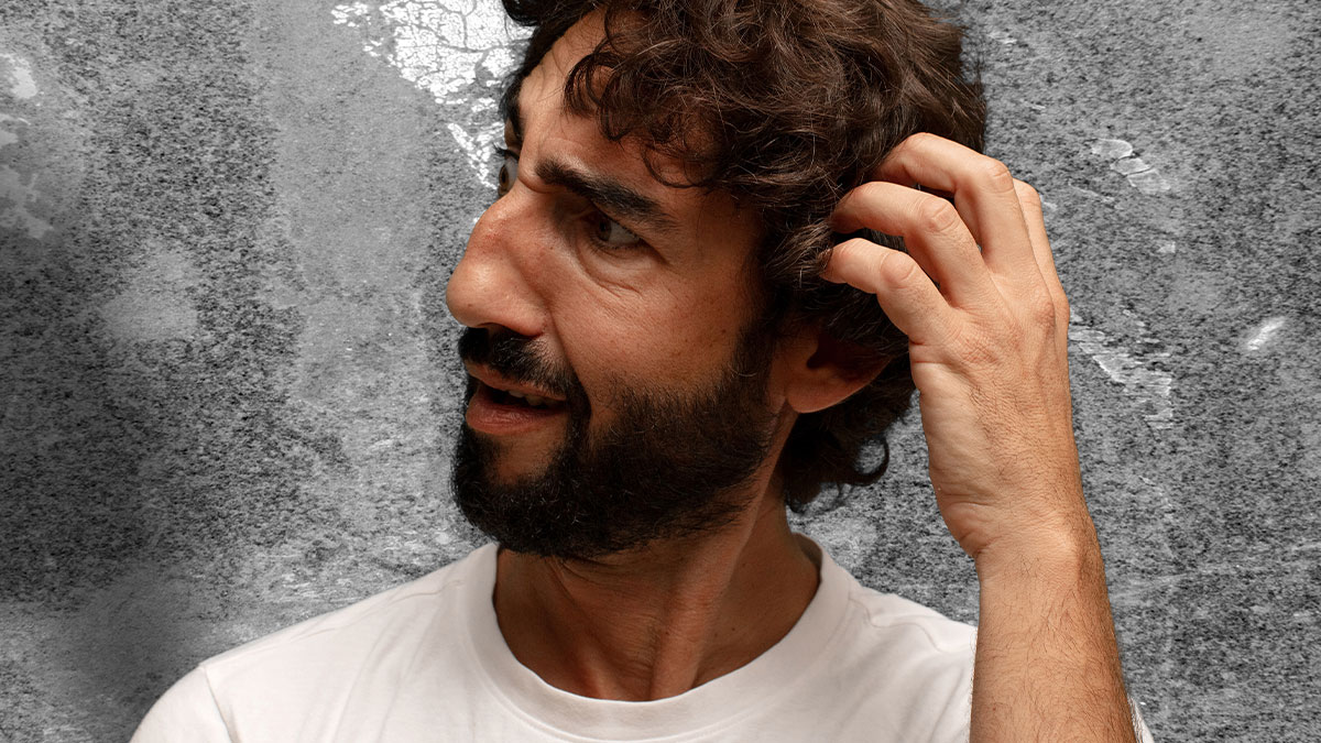 Man scratching his head, looking confused, representing professionals who work in other peopleu2019s homes experiences.