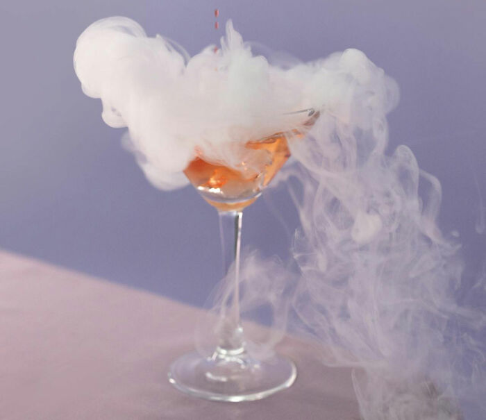 Cocktail glass with a smoky, dramatic effect representing PR campaigns and decisions that turned into complete fails.