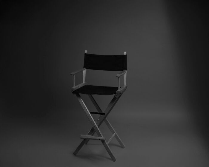Director's chair in a studio setting representing iconic TV sets from Friends' couch to the Fresh Prince's mansion. Director's chair in a studio setting representing iconic TV sets from Friends' couch to the Fresh Prince's mansion.
