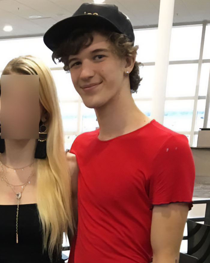 Young man in a red shirt and black cap linked to Minneapolis massacre culprit seen before fatal rampage. Young man in a red shirt and black cap linked to Minneapolis massacre culprit seen before fatal rampage.