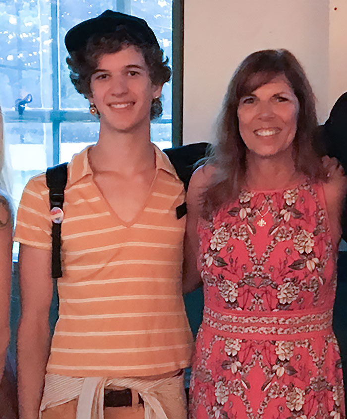 Young person and woman smiling indoors, related to Minneapolis school attacker’s mother not cooperating with cops. Young person and woman smiling indoors, related to Minneapolis school attacker’s mother not cooperating with cops.