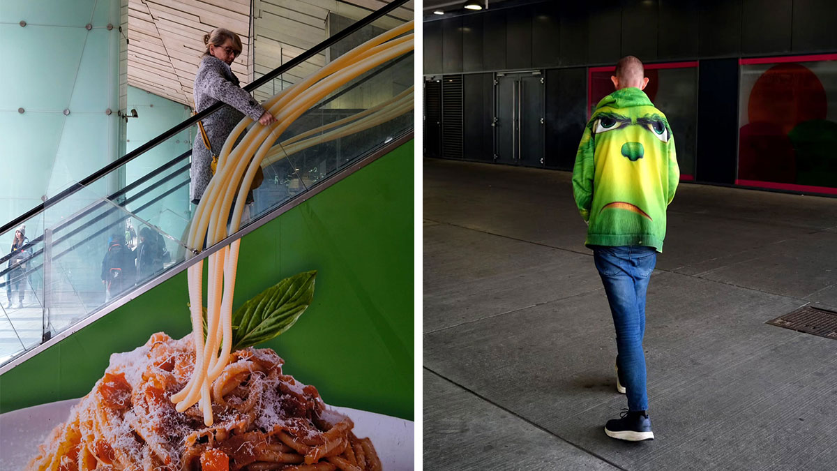 Woman on escalator with spaghetti mural and person walking in green jacket, street moments captured candidly by photographer.