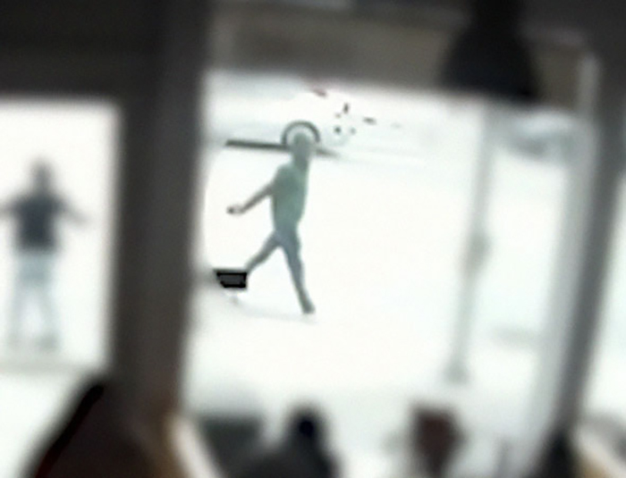 Blurry figure of a frenzied attacker captured while a good Samaritan tries to protect a helpless mom and children. Blurry figure of a frenzied attacker captured while a good Samaritan tries to protect a helpless mom and children.