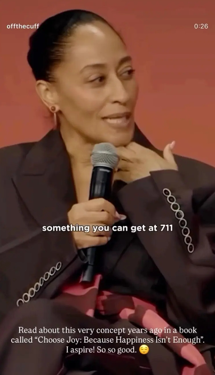 Woman speaking into a microphone during an interview, related to Travis Kelce's ex breaking silence after Taylor Swift engagement news. Woman speaking into a microphone during an interview, related to Travis Kelce's ex breaking silence after Taylor Swift engagement news.