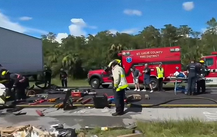 Emergency responders at a crash scene involving a truck after an illegal U-turn causing multiple fatalities. Emergency responders at a crash scene involving a truck after an illegal U-turn causing multiple fatalities.