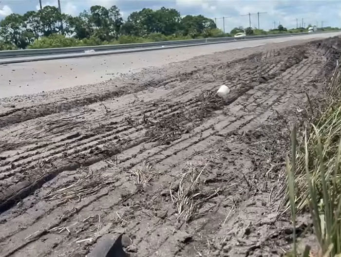 Deep tire marks on muddy roadside showing evidence of a truck driver’s illegal U-turn that caused a fatal crash. Deep tire marks on muddy roadside showing evidence of a truck driver’s illegal U-turn that caused a fatal crash.