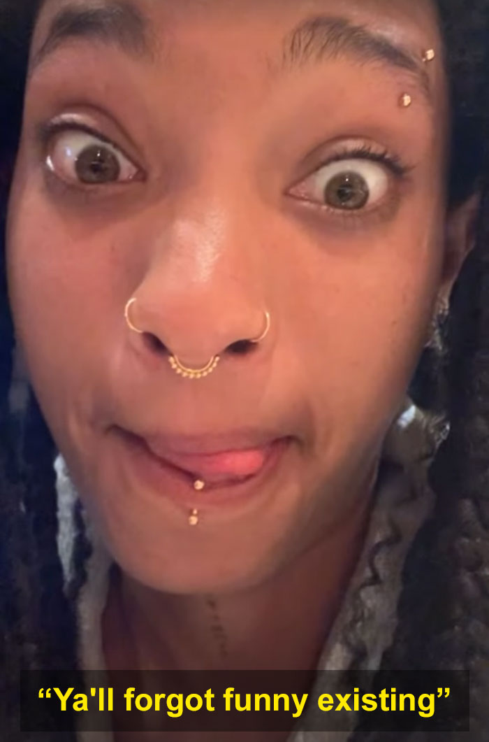 Close-up of a young woman with facial piercings making a playful face, sparking worries after crying selfie message. Close-up of a young woman with facial piercings making a playful face, sparking worries after crying selfie message.