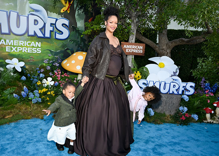 Rihanna with her children at a colorful event, as fans urge her to change the cruel name of her newborn daughter. Rihanna with her children at a colorful event, as fans urge her to change the cruel name of her newborn daughter.