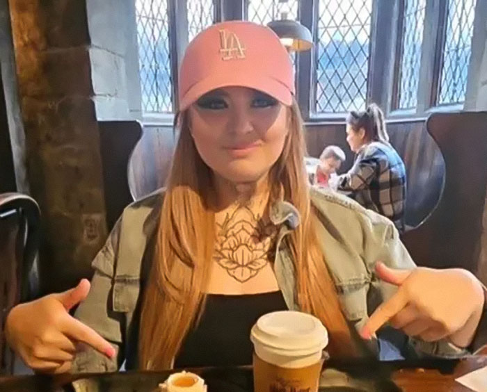 Mom who married man she met online sitting at a table with coffee, highlighting the American nightmare story. Mom who married man she met online sitting at a table with coffee, highlighting the American nightmare story.