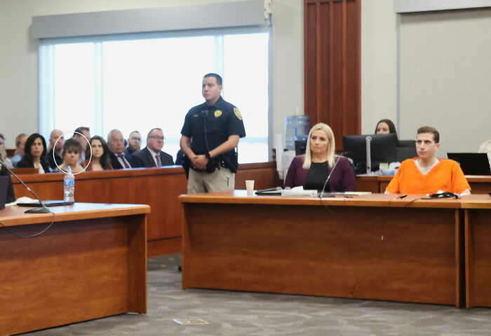 Courtroom scene showing Bryan Kohberger in an orange jumpsuit with a guard, relating to Idaho crimes evidence discussion. Courtroom scene showing Bryan Kohberger in an orange jumpsuit with a guard, relating to Idaho crimes evidence discussion.
