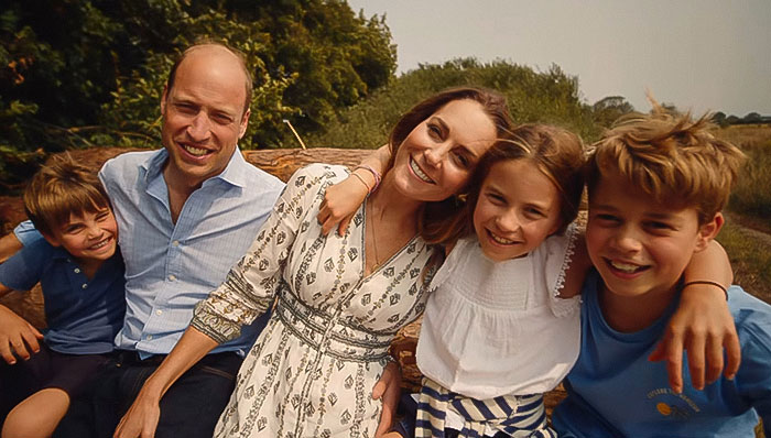 Kate Middleton with family outdoors, showing affection and kindness after royal funeral with King Charles. Kate Middleton with family outdoors, showing affection and kindness after royal funeral with King Charles.