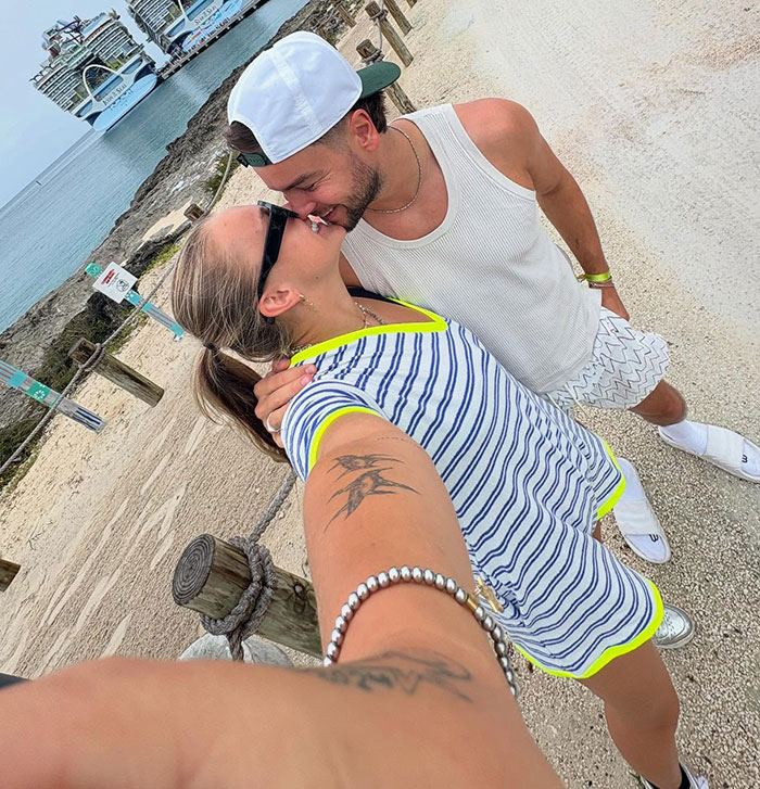 Couple sharing a close moment outdoors, highlighting JoJo Siwa’s style and marriage plans with fans intrigued. Couple sharing a close moment outdoors, highlighting JoJo Siwa’s style and marriage plans with fans intrigued.