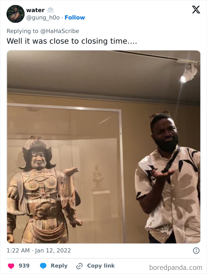 Man imitating iconic art statue with matching hand gesture in museum, showcasing creative and hilarious art imitation.