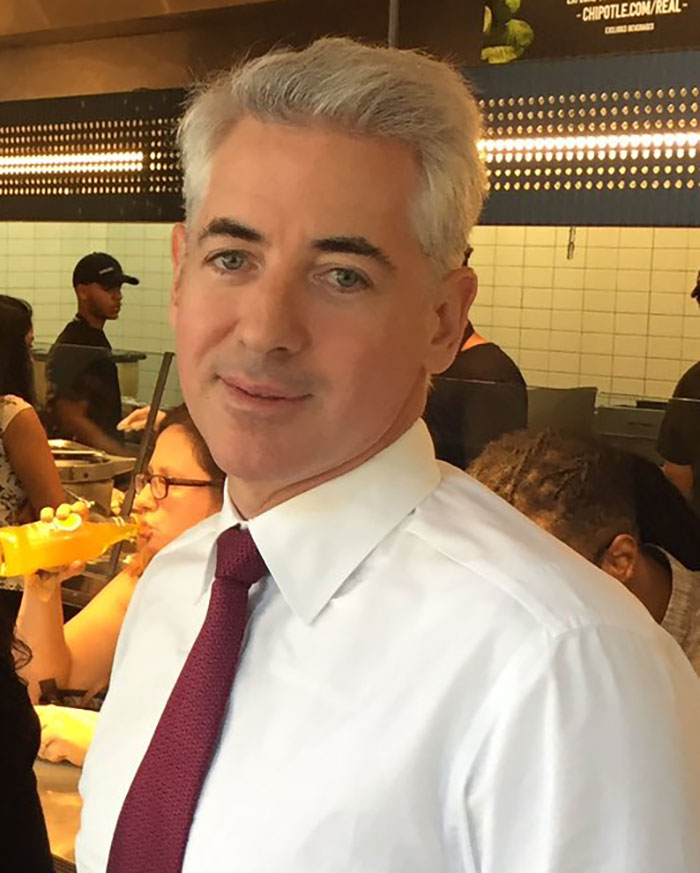 Man in white shirt and red tie posing indoors, with people and restaurant setting in the background, discussing Charlie Kirk. Man in white shirt and red tie posing indoors, with people and restaurant setting in the background, discussing Charlie Kirk.