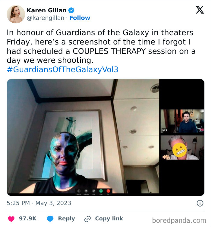 Karen Gillan in a video call with colorful face paint, sharing an entertaining moment from filming superhero culture.