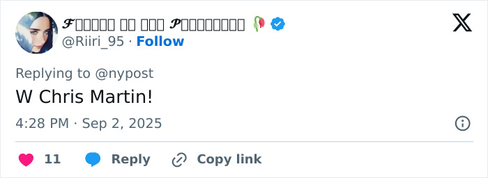 User profile picture showing a person with dark hair and makeup, replying to a tweet about Coldplay’s Chris Martin. User profile picture showing a person with dark hair and makeup, replying to a tweet about Coldplay’s Chris Martin.