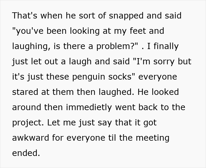 Man addresses coworker about colorful socks during tense workplace harassment incident in meeting room.