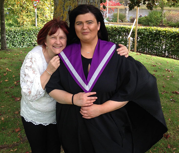 Mother and daughter posing outdoors, highlighting the story of a mom who married man she met online found lifeless. Mother and daughter posing outdoors, highlighting the story of a mom who married man she met online found lifeless.