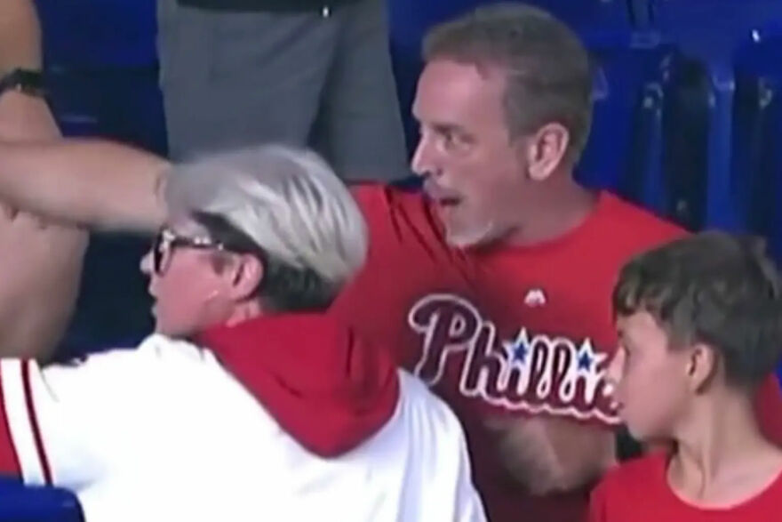 Woman mistaken for Phillies Karen wearing glasses and white hoodie during home run ball meltdown at baseball game. Woman mistaken for Phillies Karen wearing glasses and white hoodie during home run ball meltdown at baseball game.