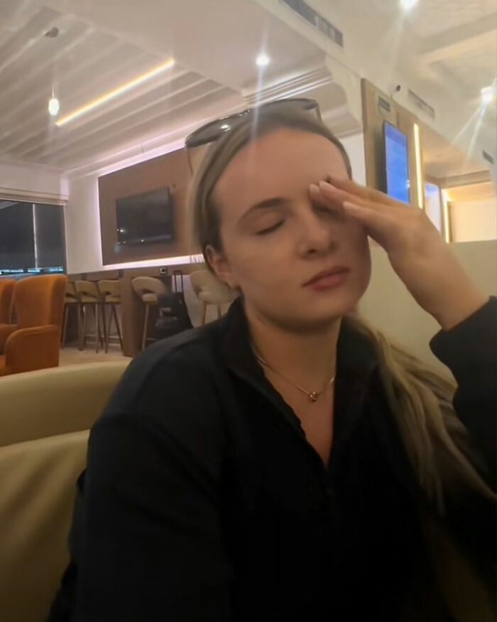 Tourist looking stressed and confused inside airport lounge after boarding flight to Africa instead of France. Tourist looking stressed and confused inside airport lounge after boarding flight to Africa instead of France.