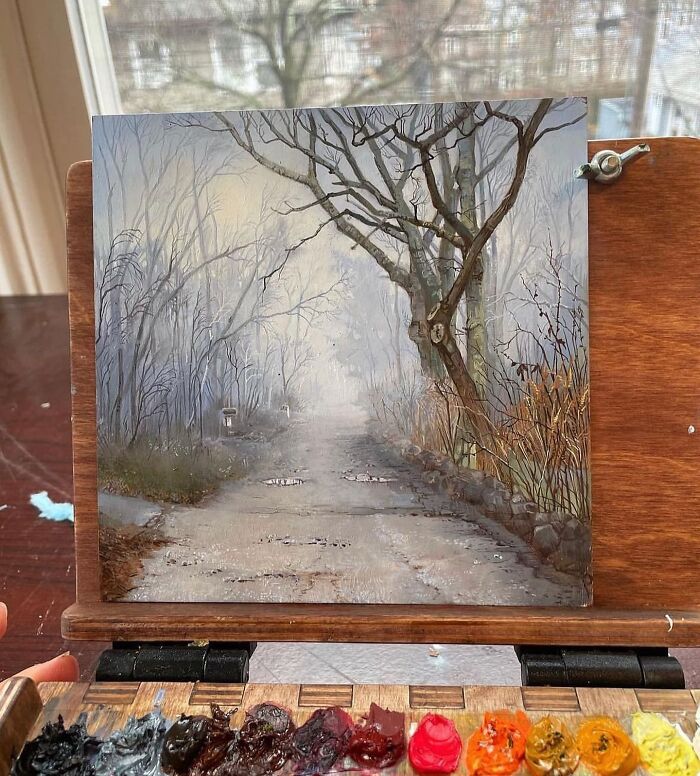 Detailed painting by Dina Brodsky showing a foggy path with bare trees, highlighting the beauty of the natural world.