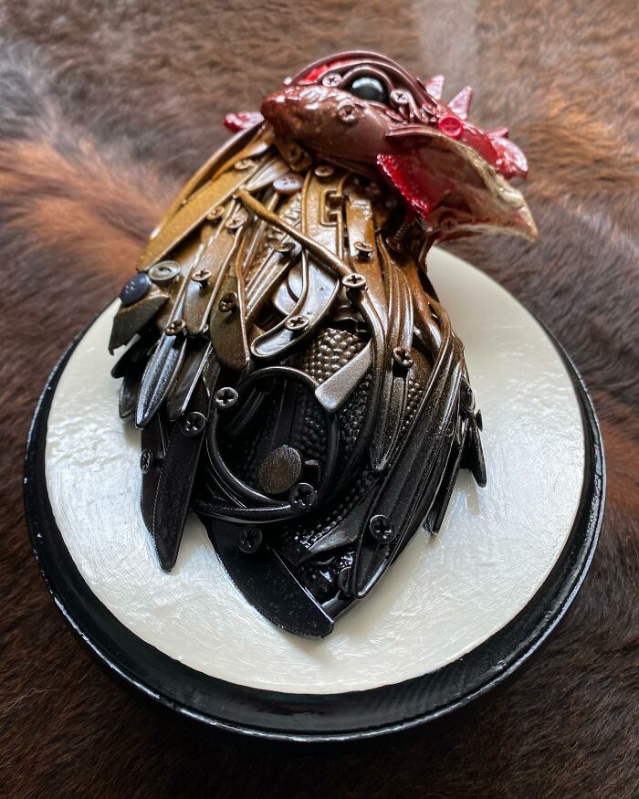 Rooster sculpture made from trash showcasing stunning animal sculptures using recycled materials in detailed art form.