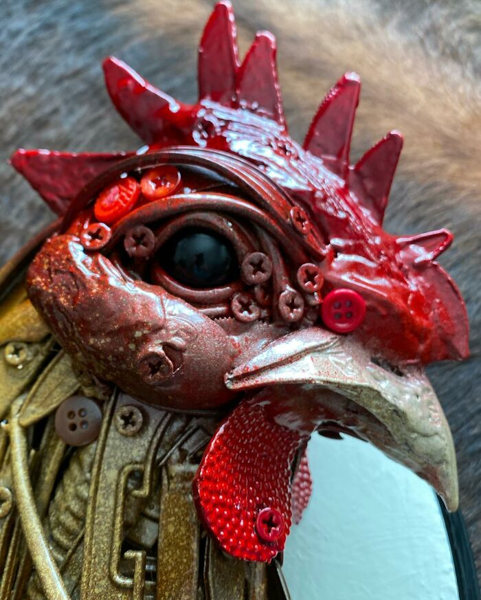 Rooster sculpture made from trash showcasing stunning animal sculptures using recycled materials in detailed art form.