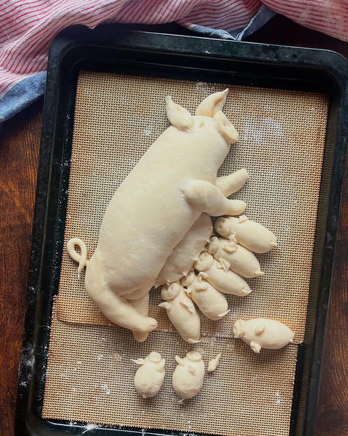 Creative meals for kids featuring a Japanese mom's unique bread shaped like a mama pig and her piglets cooling on a rack.