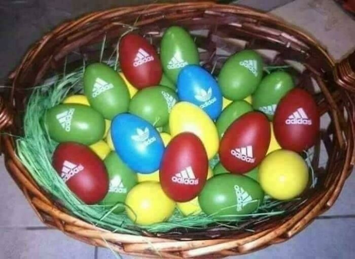 Basket of colorful Adidas-branded eggs representing unique Eastern Europe memes and cultural humor.