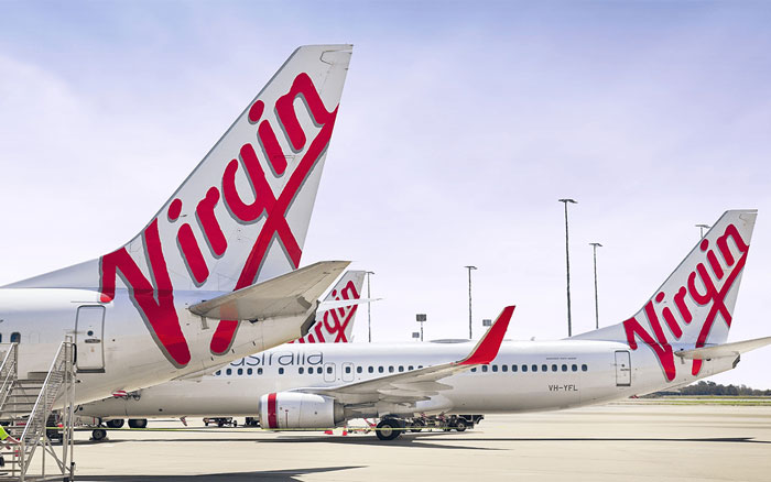 Virgin Australia planes parked on runway, related to doctor furious after Virgin Australia staff removed her from lounge. Virgin Australia planes parked on runway, related to doctor furious after Virgin Australia staff removed her from lounge.