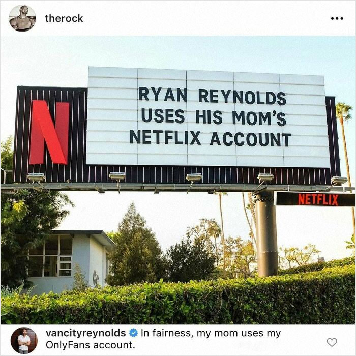 Netflix billboard showing a funny celeb comment by Ryan Reynolds, an example of celebs dropping unexpected gems in comments.