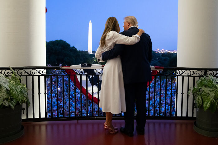 Donald Trump and Melania share a quiet moment on balcony with Washington Monument as body language experts analyze finger-pointing exchange. Donald Trump and Melania share a quiet moment on balcony with Washington Monument as body language experts analyze finger-pointing exchange.