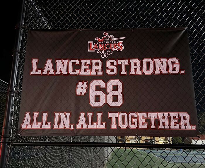 Banner at a football field with Lancer Strong message supporting school action against football player in incident Banner at a football field with Lancer Strong message supporting school action against football player in incident
