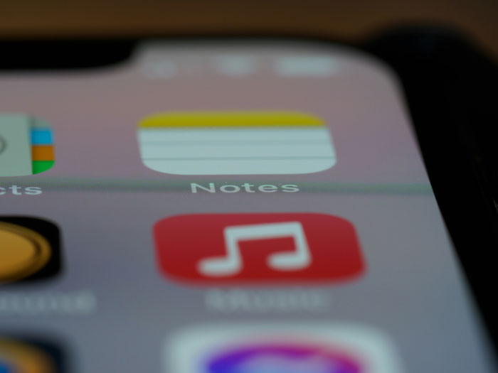 Close-up of a phone screen showing app icons, illustrating moments when a glance at a phone changed everything quickly.