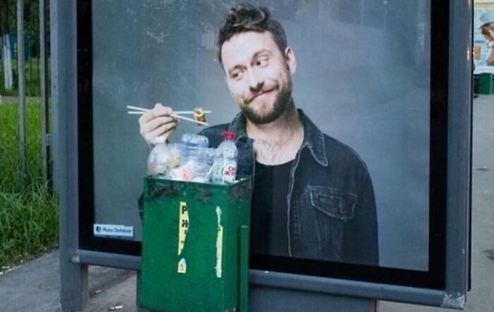 Man in an advertising placement fail interacts humorously with a trash bin, illustrating advertising placement fails that made people laugh.