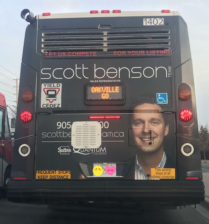 Bus advertising placement fail showing distorted face due to design elements, a humorous example of advertising placement fails.