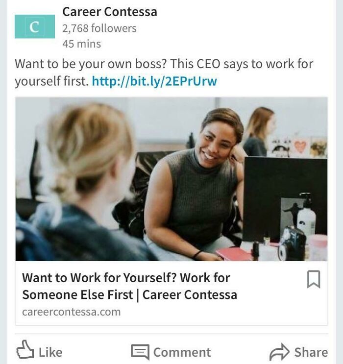 Two women engaged in a conversation at a desk showcasing companies that failed miserably on social media campaigns.