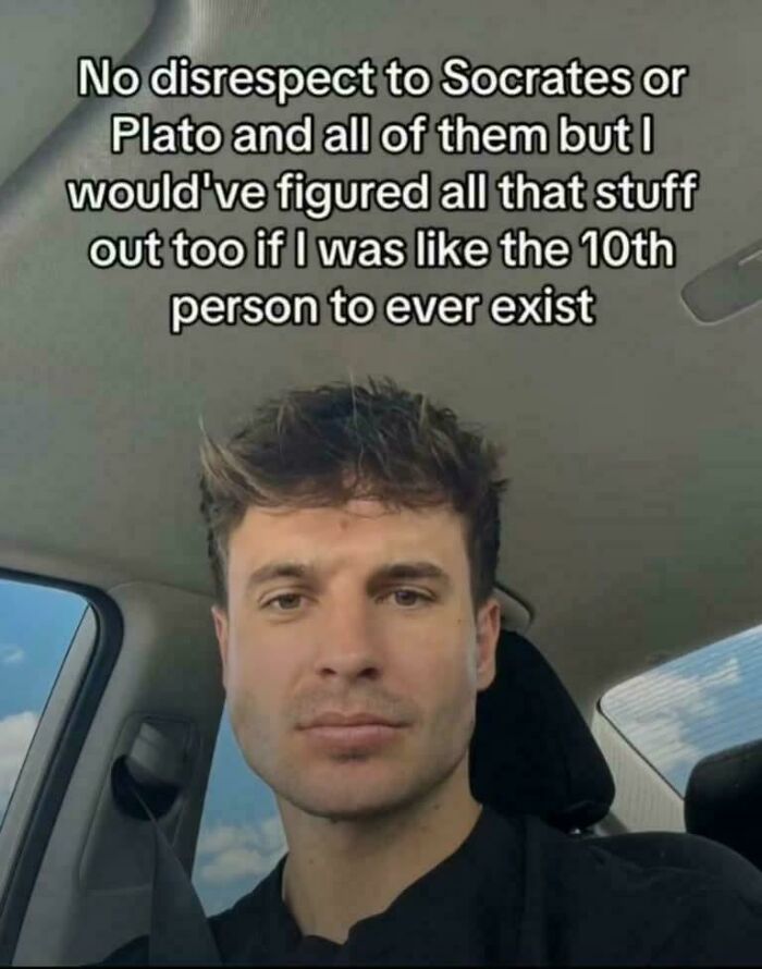 Young man in a car shares a thoughtful TikTok screenshot about Socrates and ancient philosophy to feel very smart.